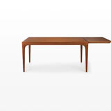 Extendable dining table in teak by Johannes Andersen for Uldum Møbelfabrik