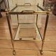 Rolling dessert trolley in gilded brass style Jansen