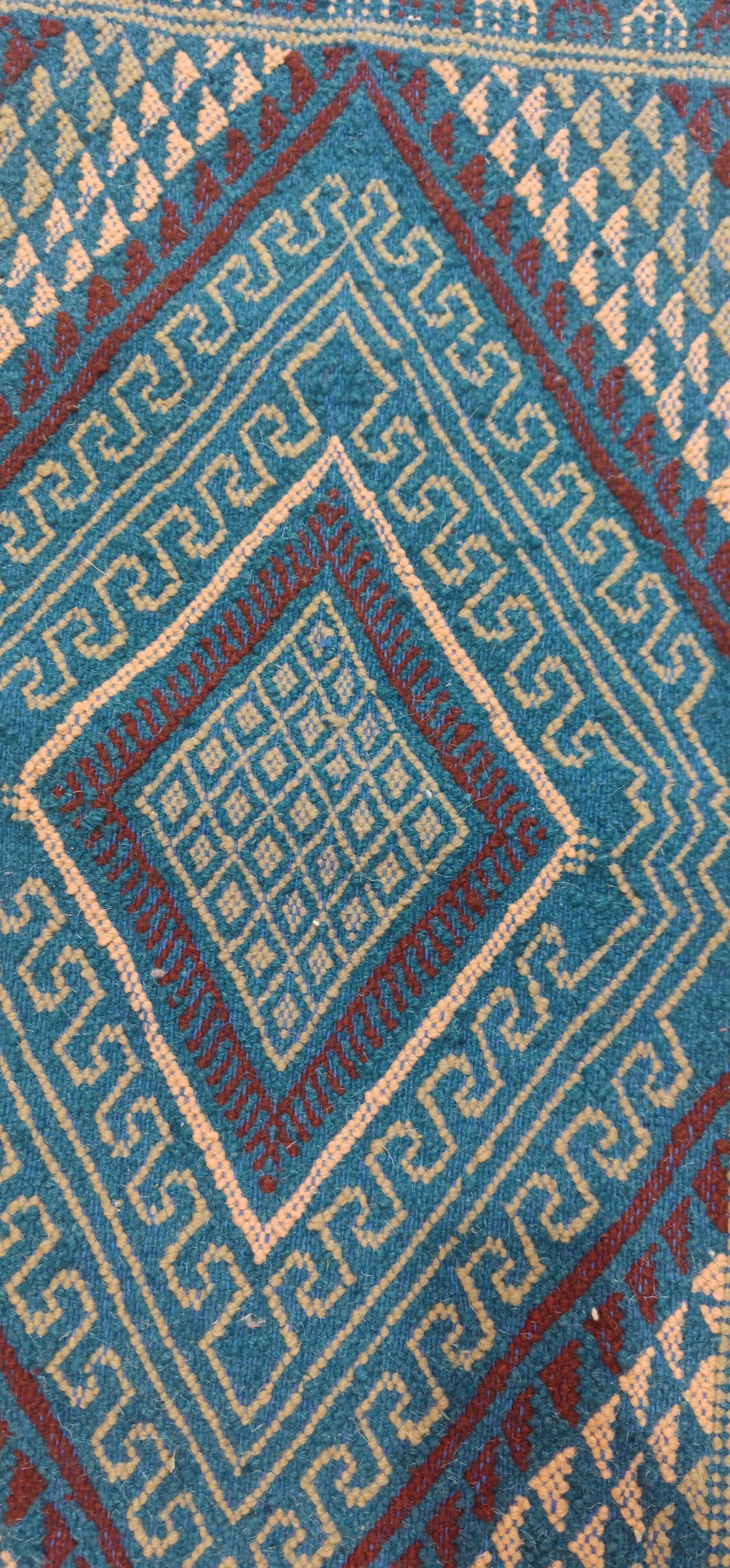 Handmade blue mergoum rug in natural wool