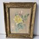 Watercolour painting of pink flowers signed Simonne 1922 in a gilded wooden frame.