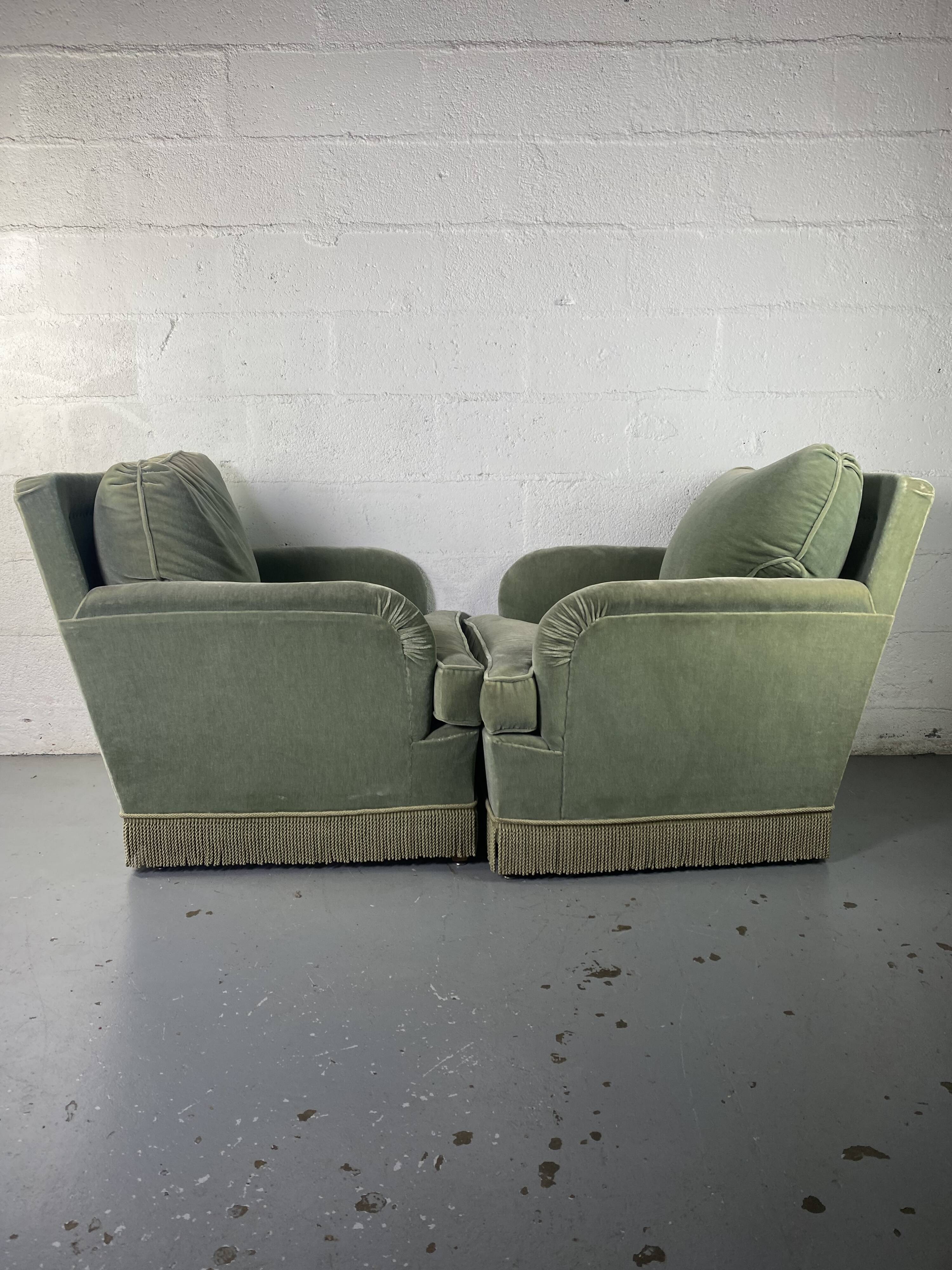 Pair of green velvet club armchairs