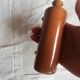 Small brown ceramic stoneware soliflore vase