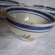 Set of three antique earthenware bowls from HB Quimper, signed.