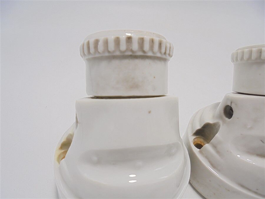 Duo of white ceramic wall lamps