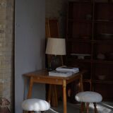 Modern Danish, a pair of tripod stools, seats reupholstered in lambswool, 1950s.