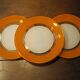 Small vintage orange and white Duralex plates
