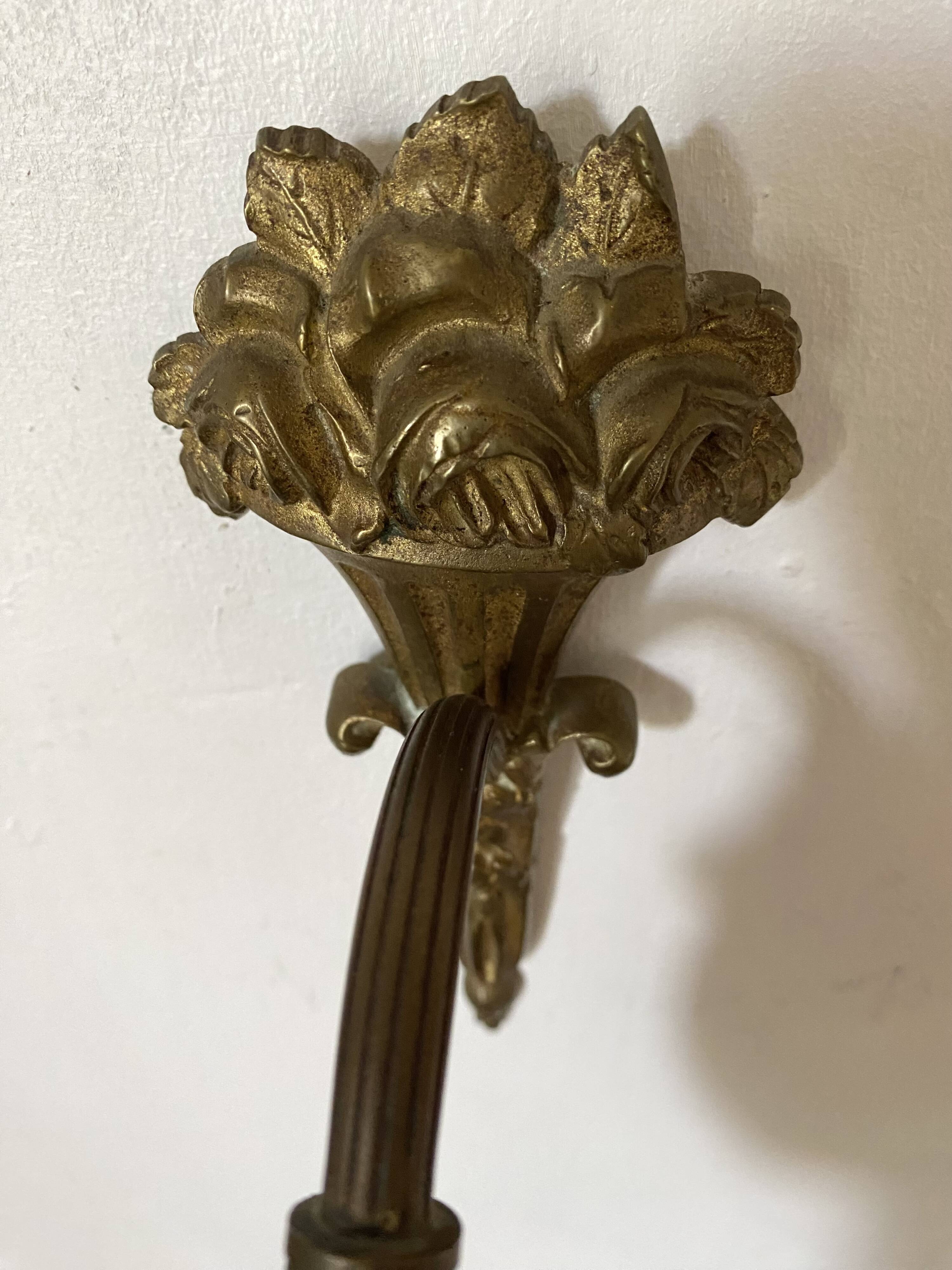 Antique bronze and glass paste wall light