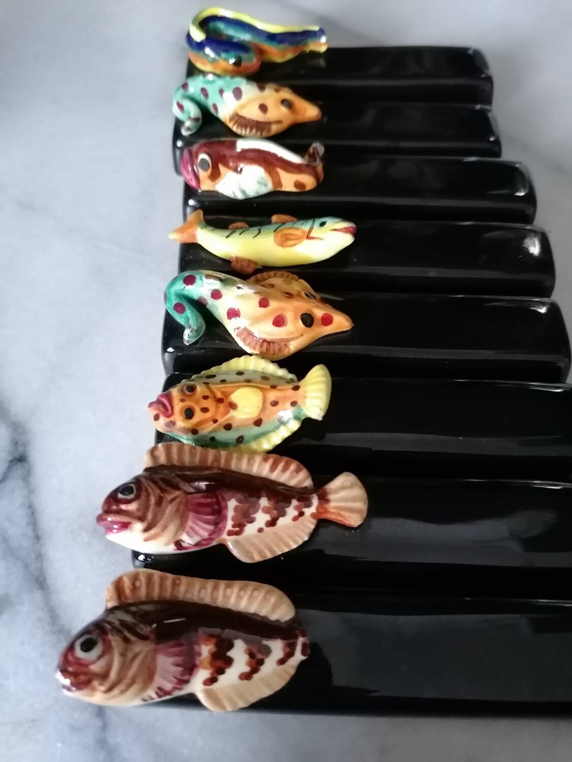 Vintage fish slip knife holders