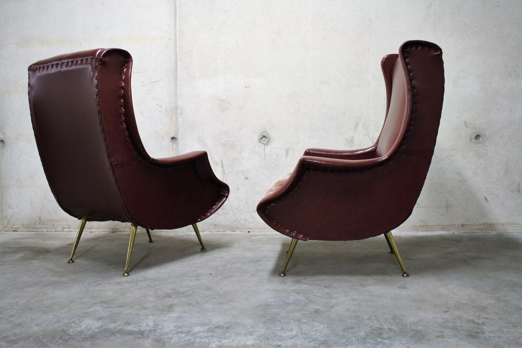 Pair of armchairs vintage with feet brass Italy 1960 s
