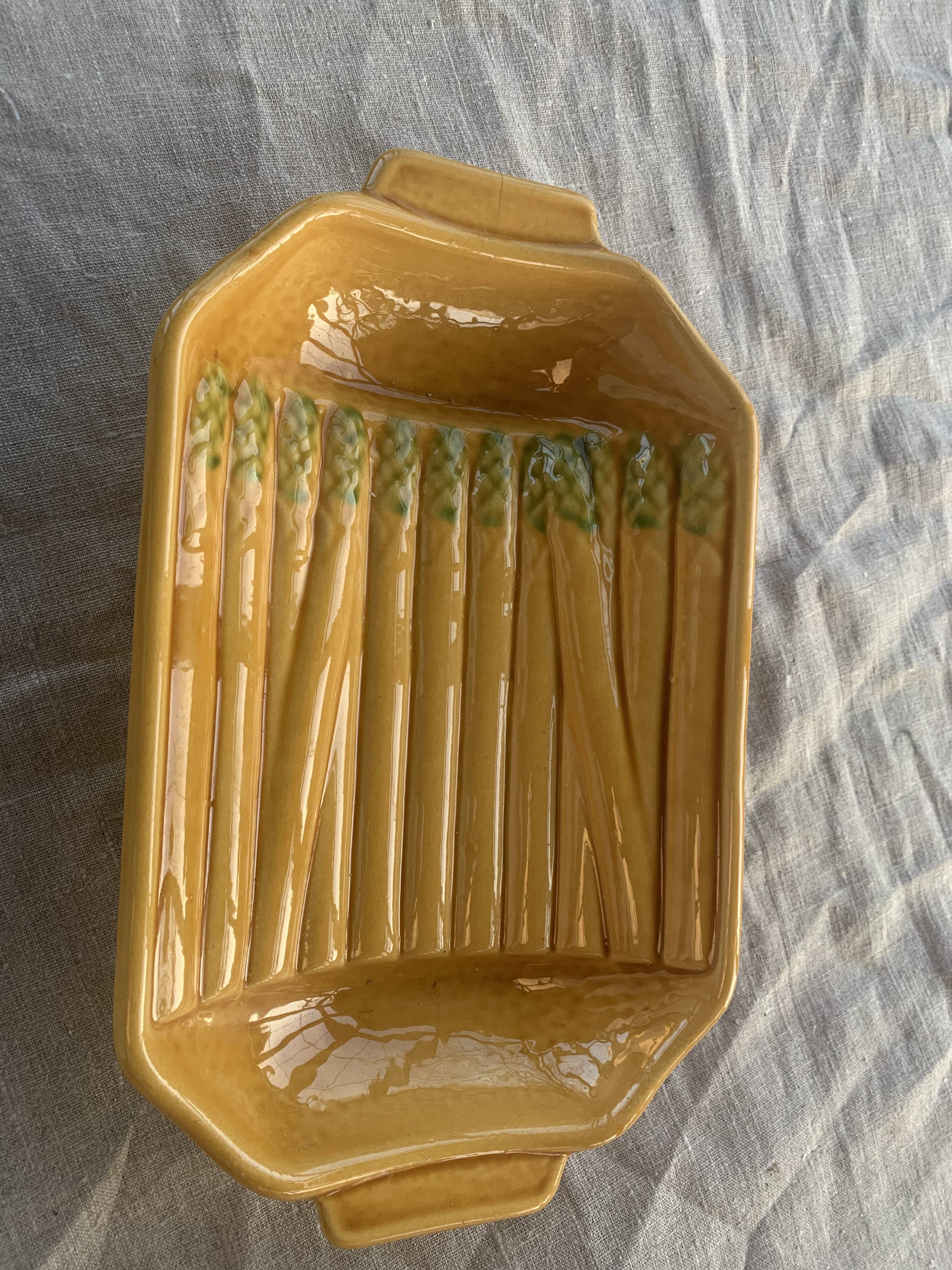 Vintage slip glazed ceramic asparagus dish