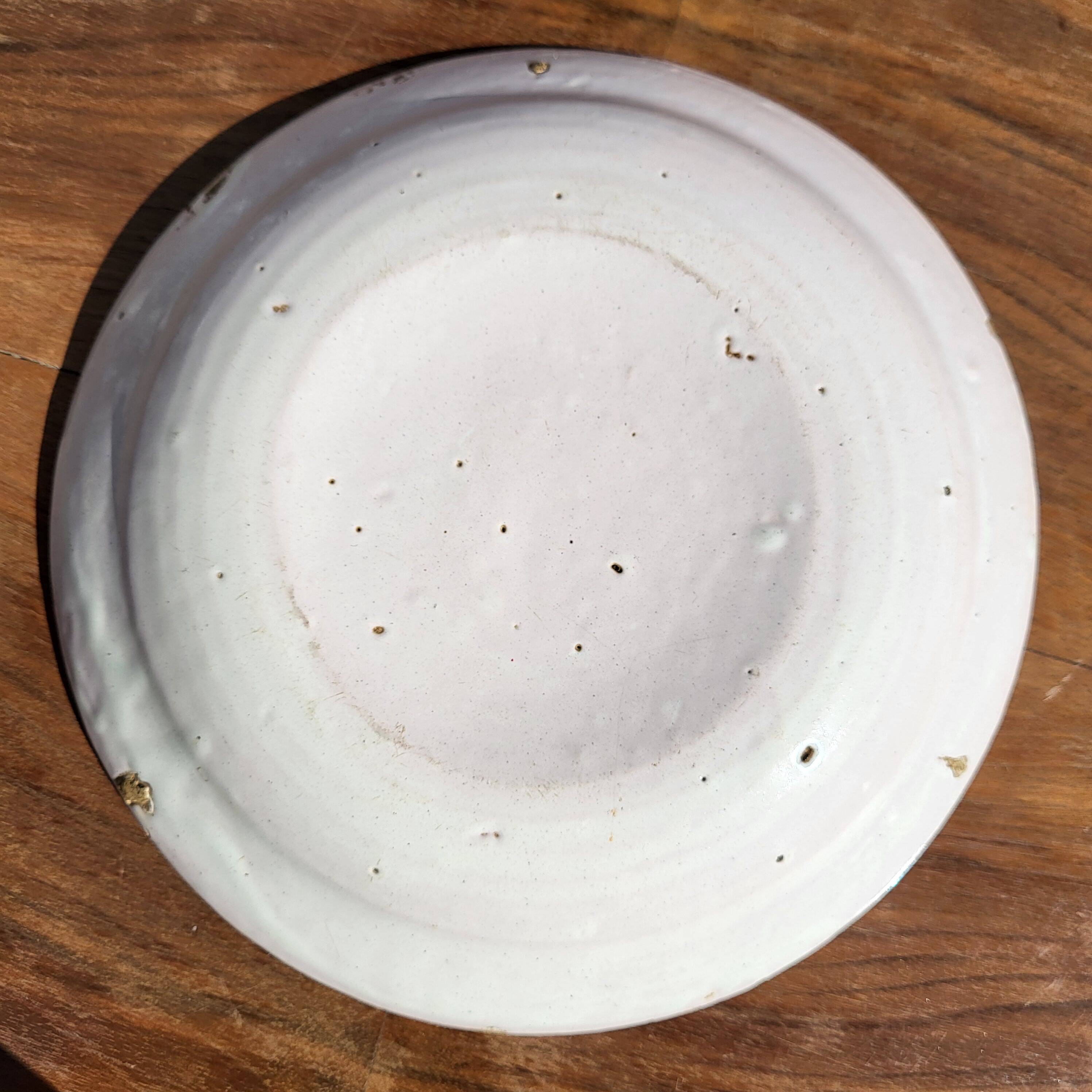 Grand Feu earthenware plate, Manganese decoration - 18th century