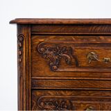 Oak Louis XV style chest of drawers, France, circa 1920.