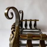 Old cast iron and brass log holder