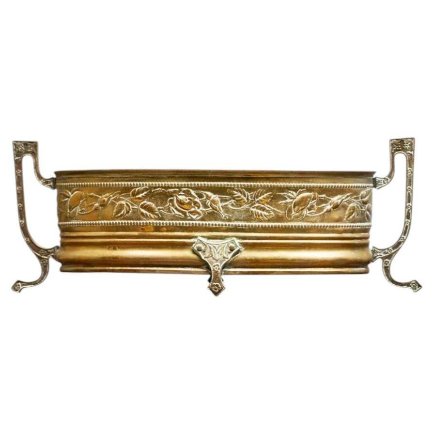 Neoclassical cache-pot in patinated brass, 19th century.