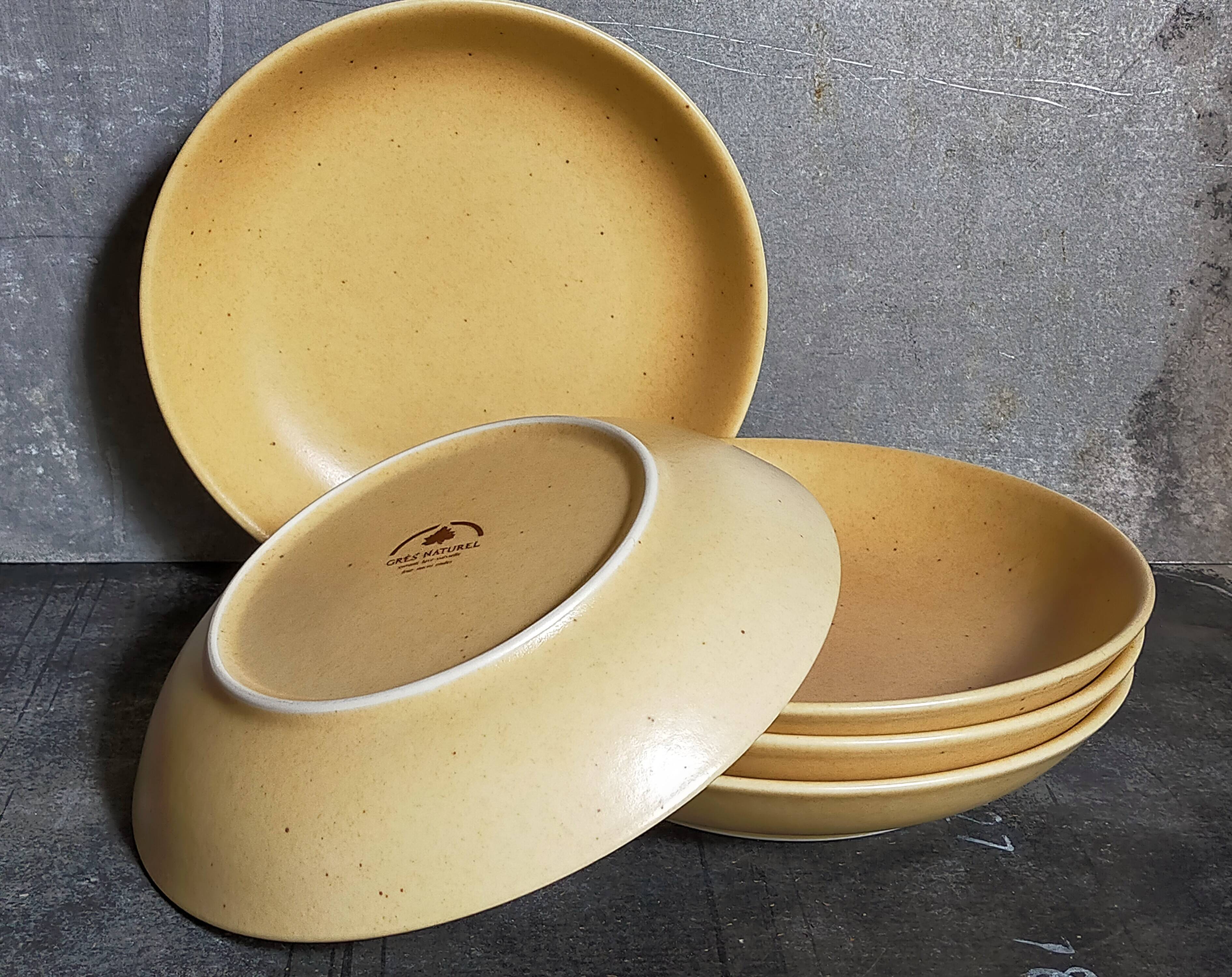 Five vintage natural stoneware soup plates