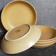 Five vintage natural stoneware soup plates