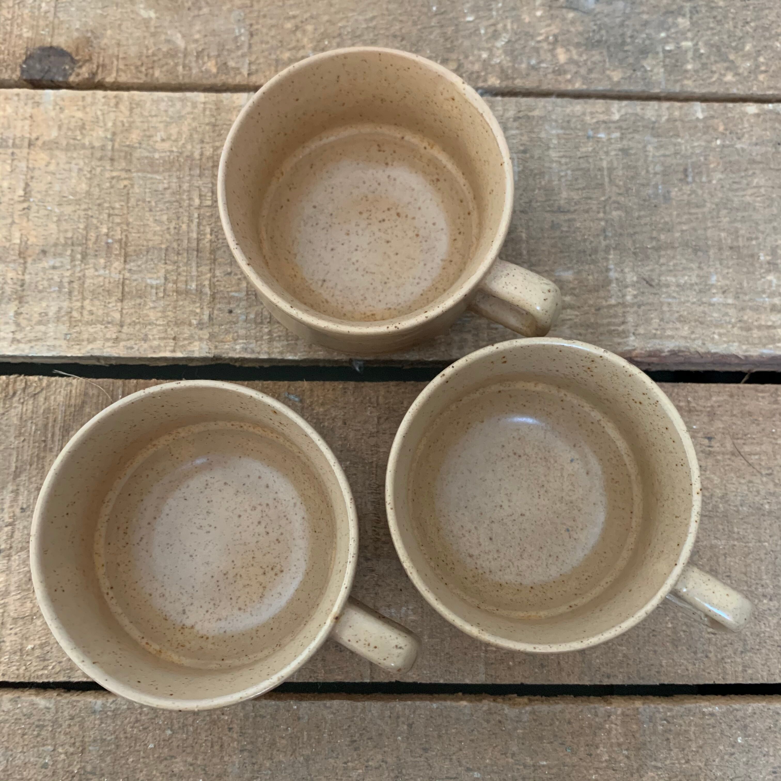 Coffee cups in sandstone