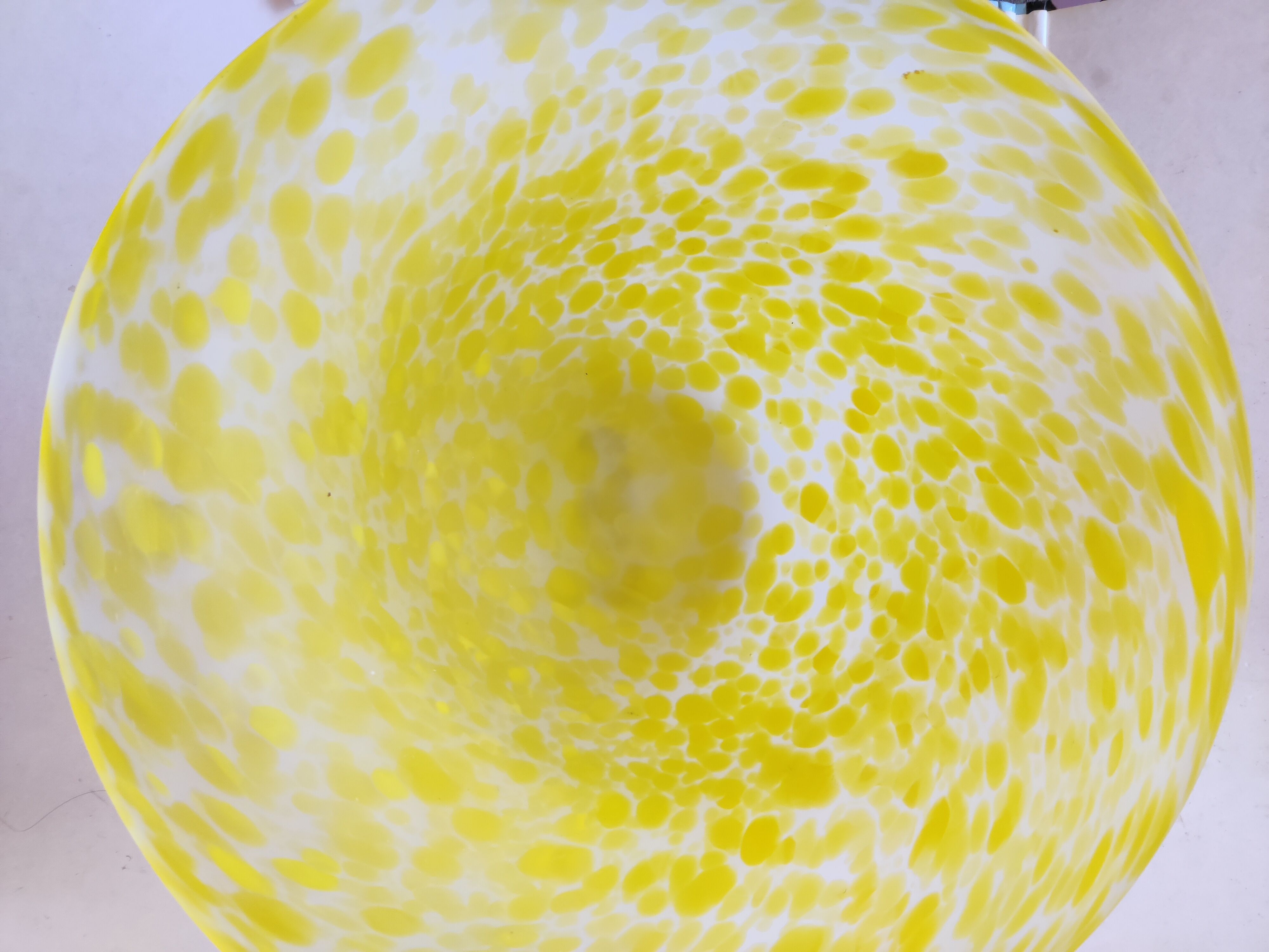 Yellow speckled frosted glass bowl