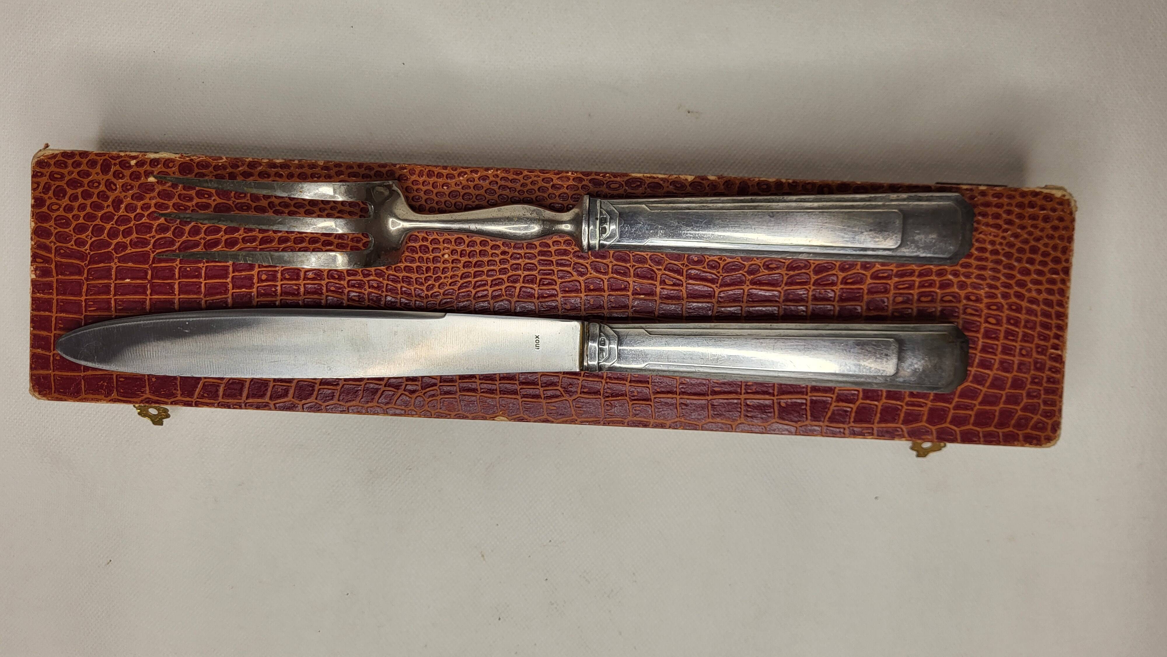Art Deco silver plated lamb cutlery