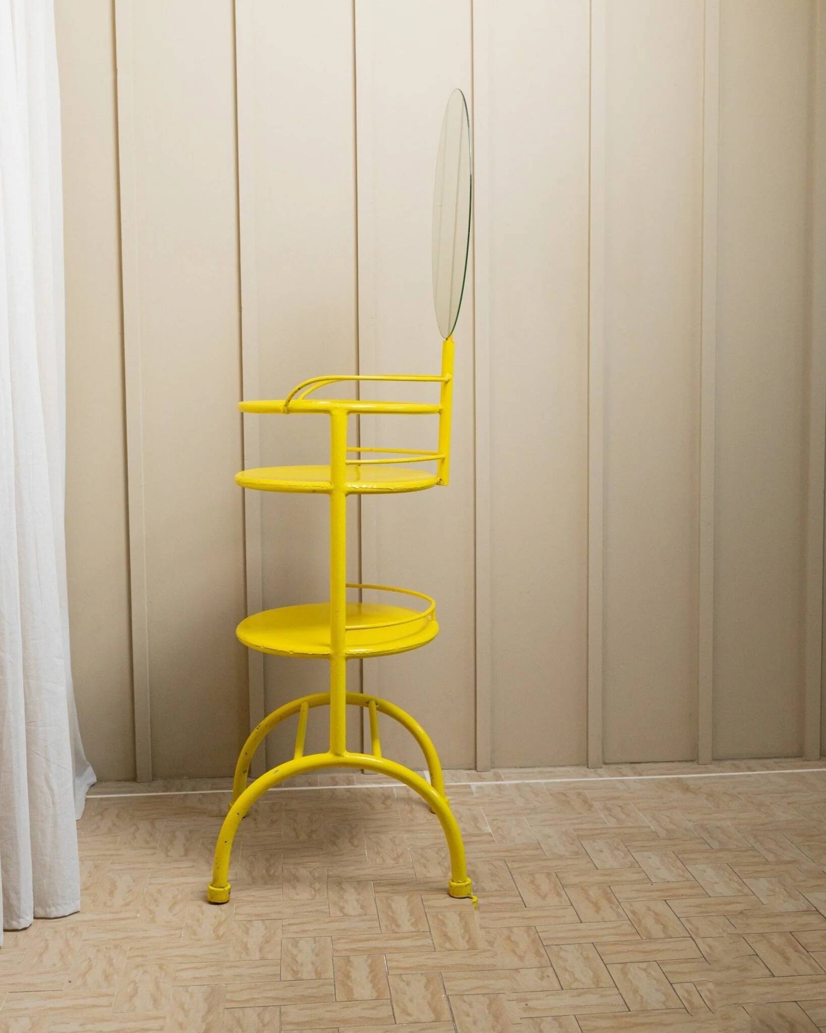 Yellow metal side table with swiveling oval mirror and two tray shelves, vintage 1960s Italy