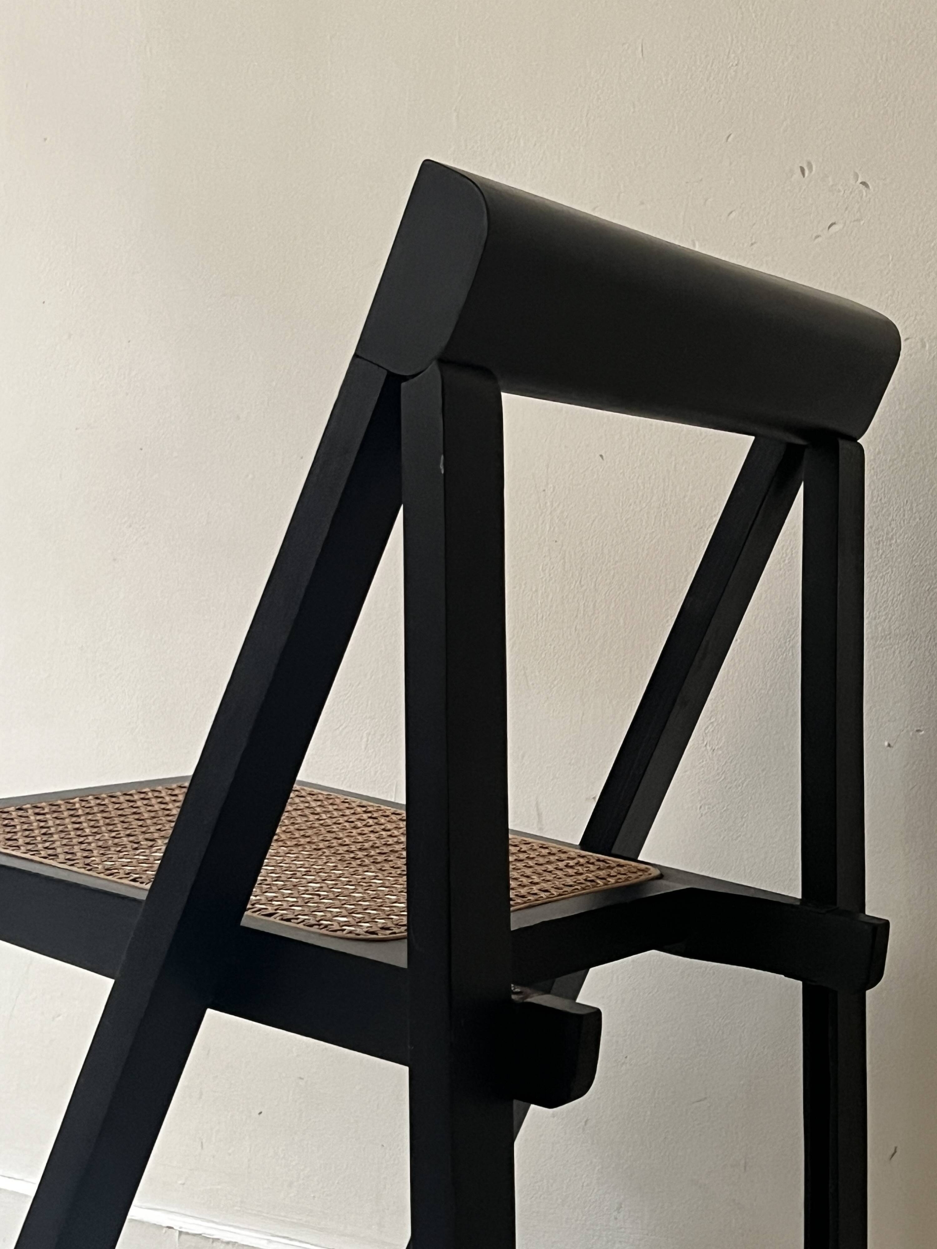 Folding designer chair in black wood and caning, Aldo Jacober 1970