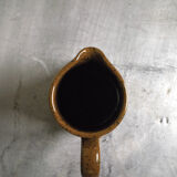 Milk pitcher in spotted sandstone