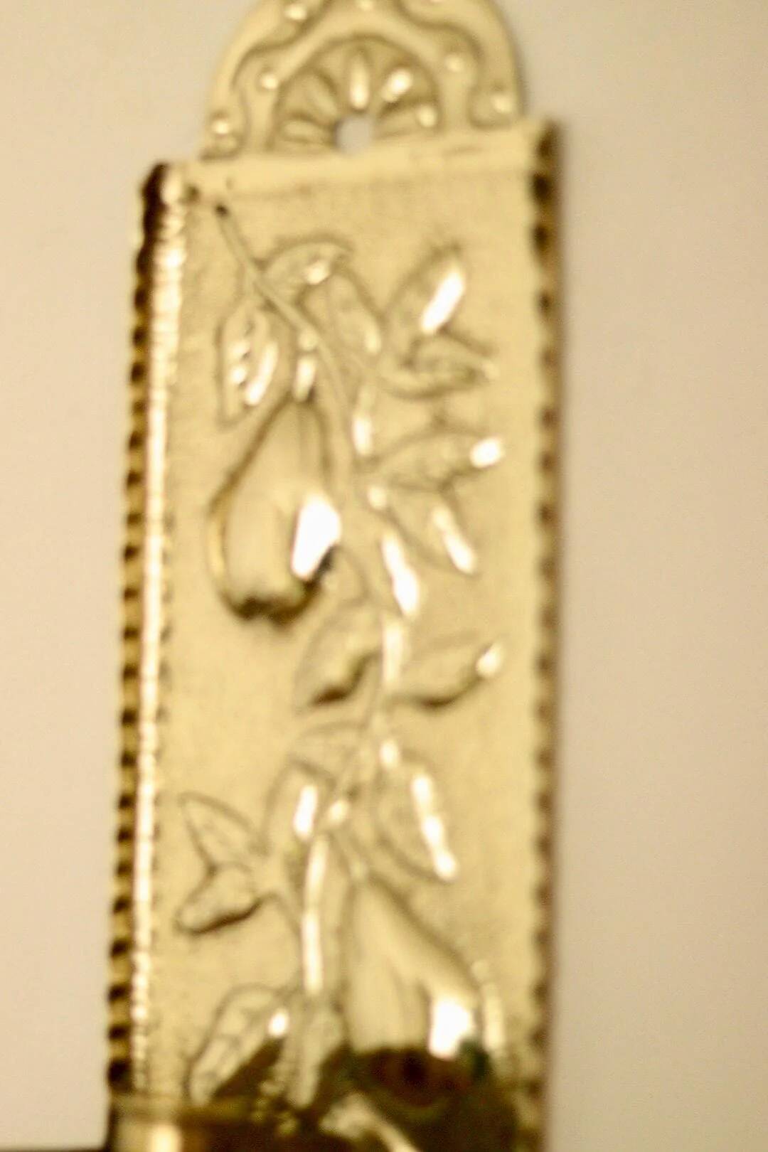 Vintage European brass sconce in pear motif