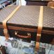 Louis Vuitton leather suitcase