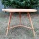 Vintage round rattan tripod coffee table