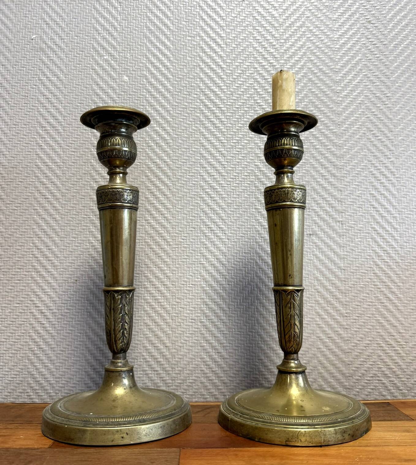 Pair of Empire period candlesticks in gilded bronze circa 1820