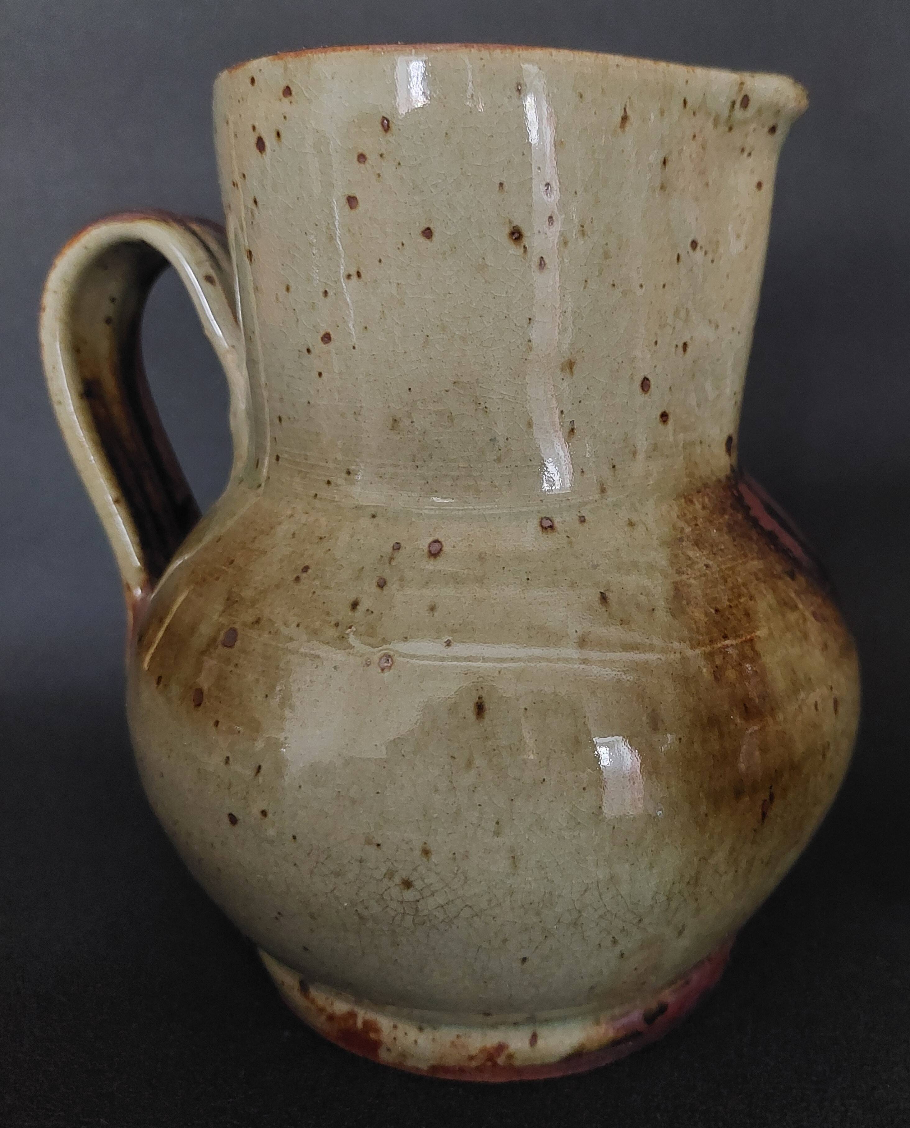 20th century glazed terracotta pitcher