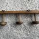 Old wooden wall coat rack