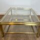 Modernist coffee table in brass and glass tops by Guy Lefèvre for Maison Jansen.