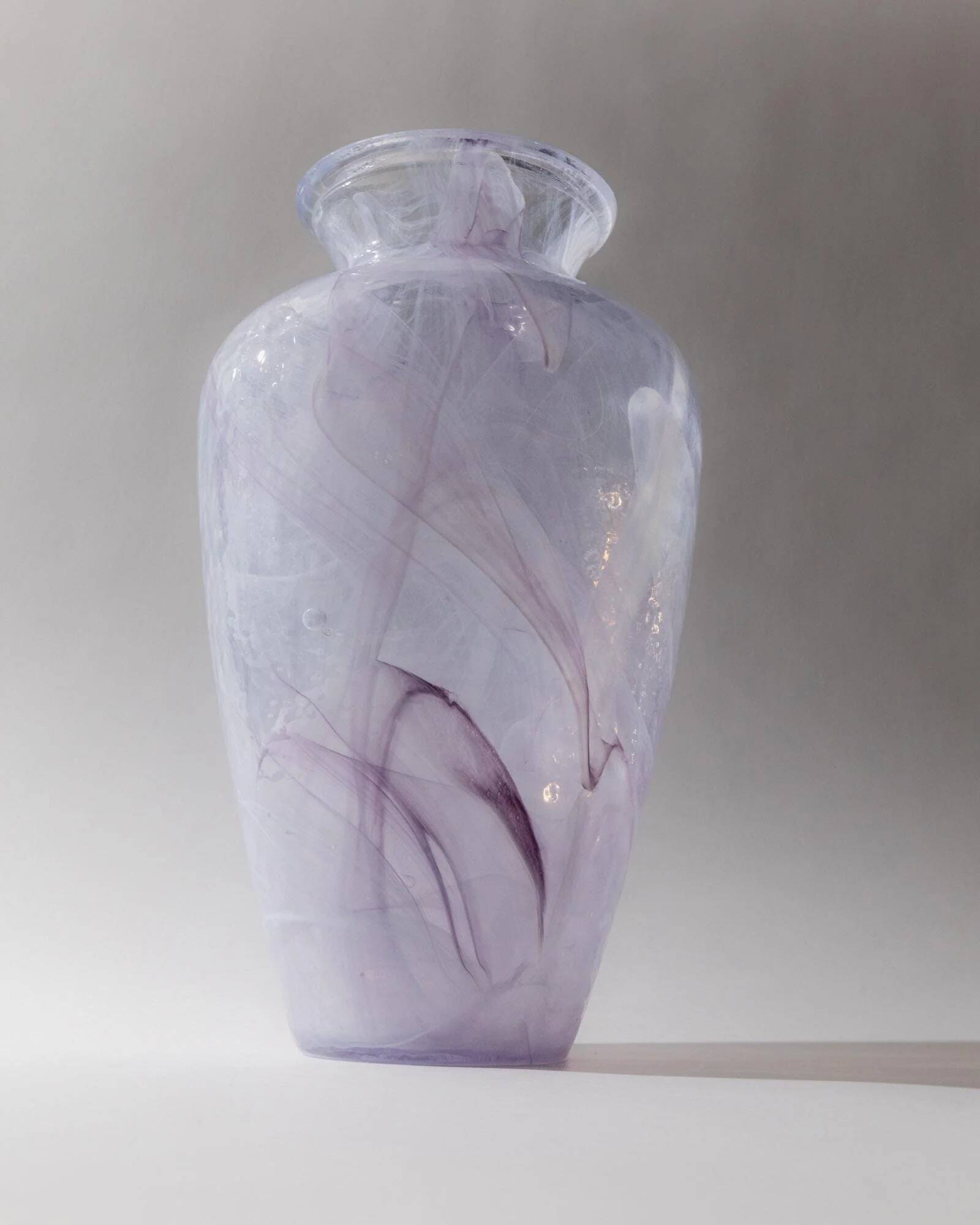 Vintage Murano glass vase from the 1970s, lilac and white swirl.