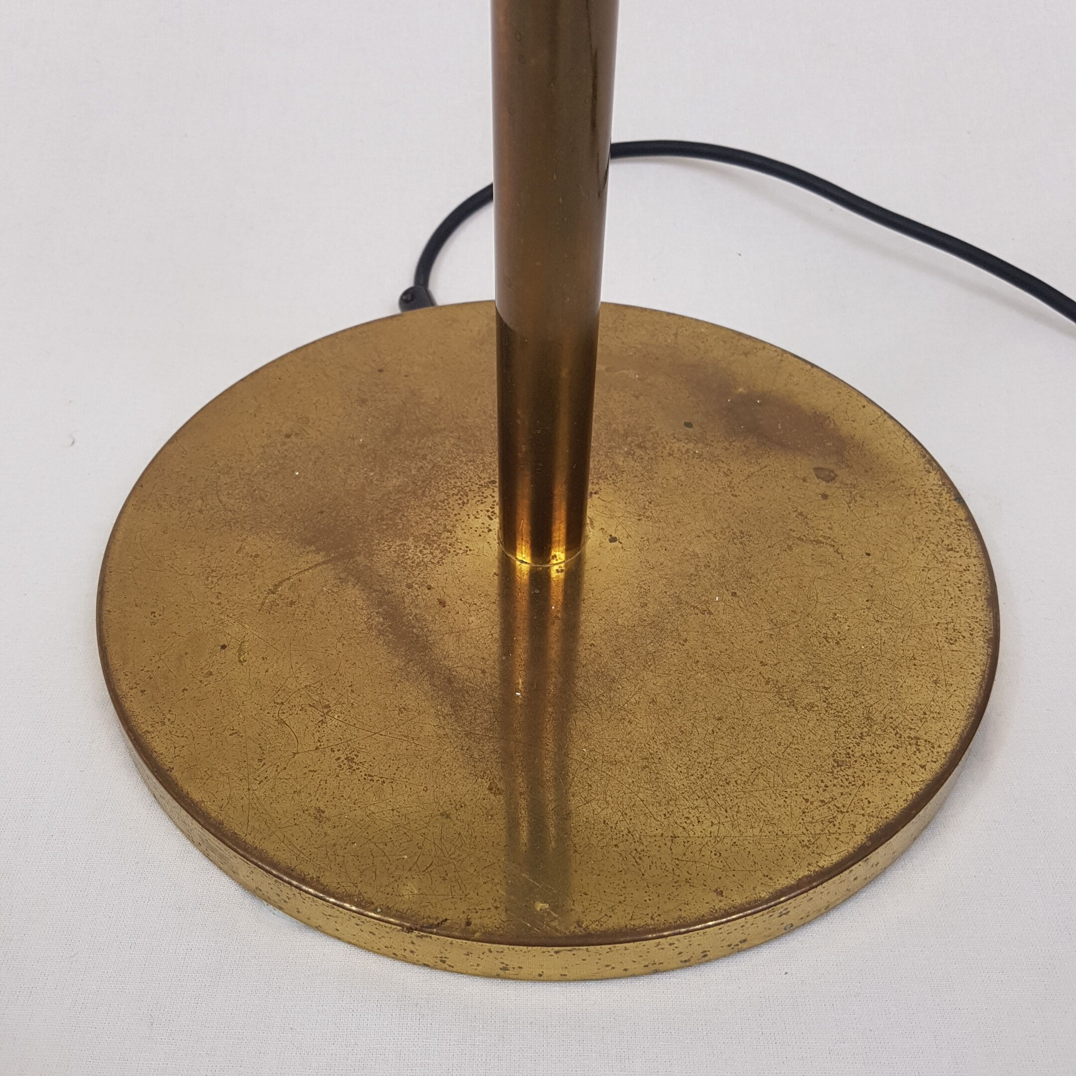 Articulated brass floor lamp