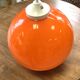 Orange globe suspension