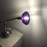 Articulated chromed metal lamp