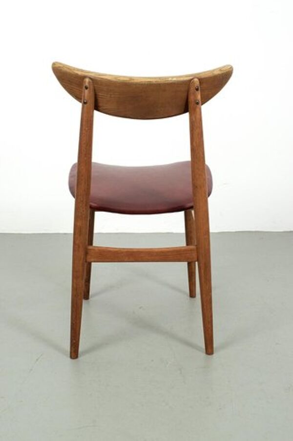 Chaise vintage avec simili cuir rouge