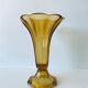Ancient tulip vase in amber glass