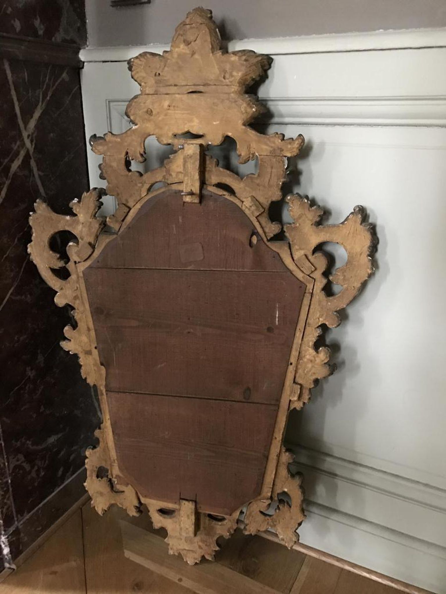Miroir en bois sculpté doré d'époque régence 60x97cm