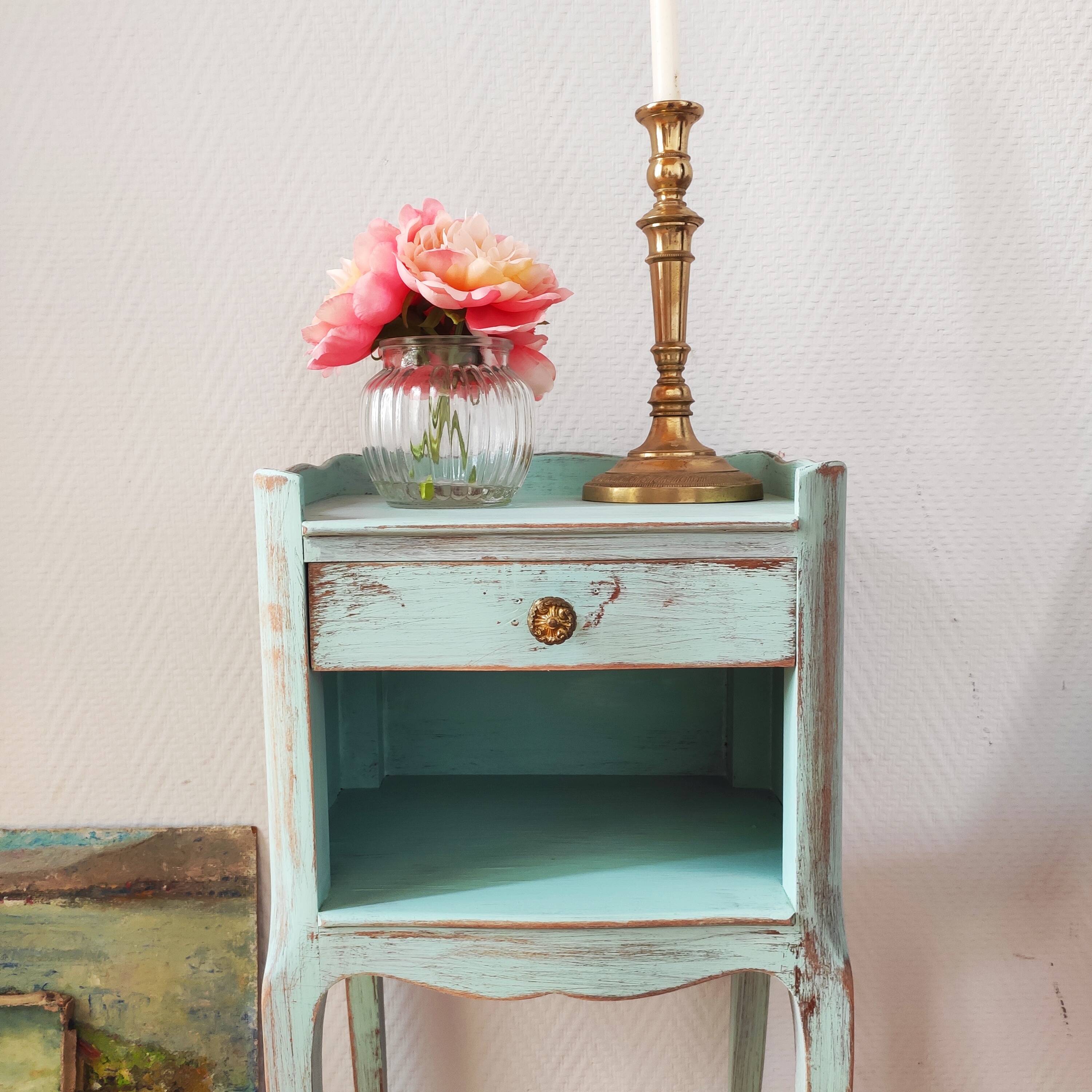 Patinated bedside table end of sofa