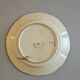 Decorative plate in glazed earthenware HB Quimper with ethnic patterns.