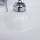 Swan neck and white glass wall lights