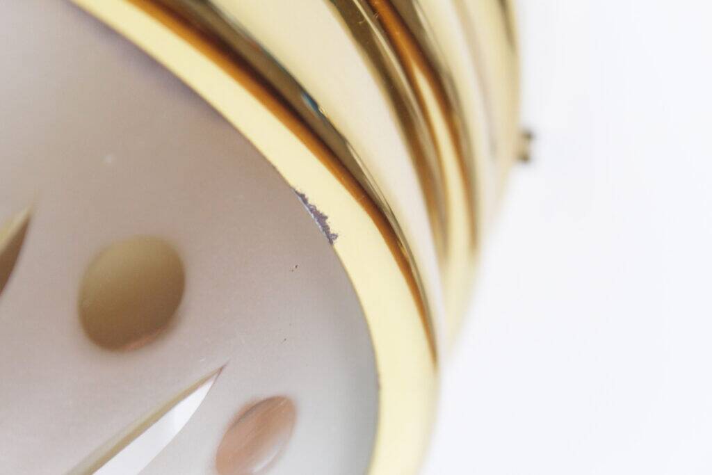 Single vintage brass ceiling light with glass globe