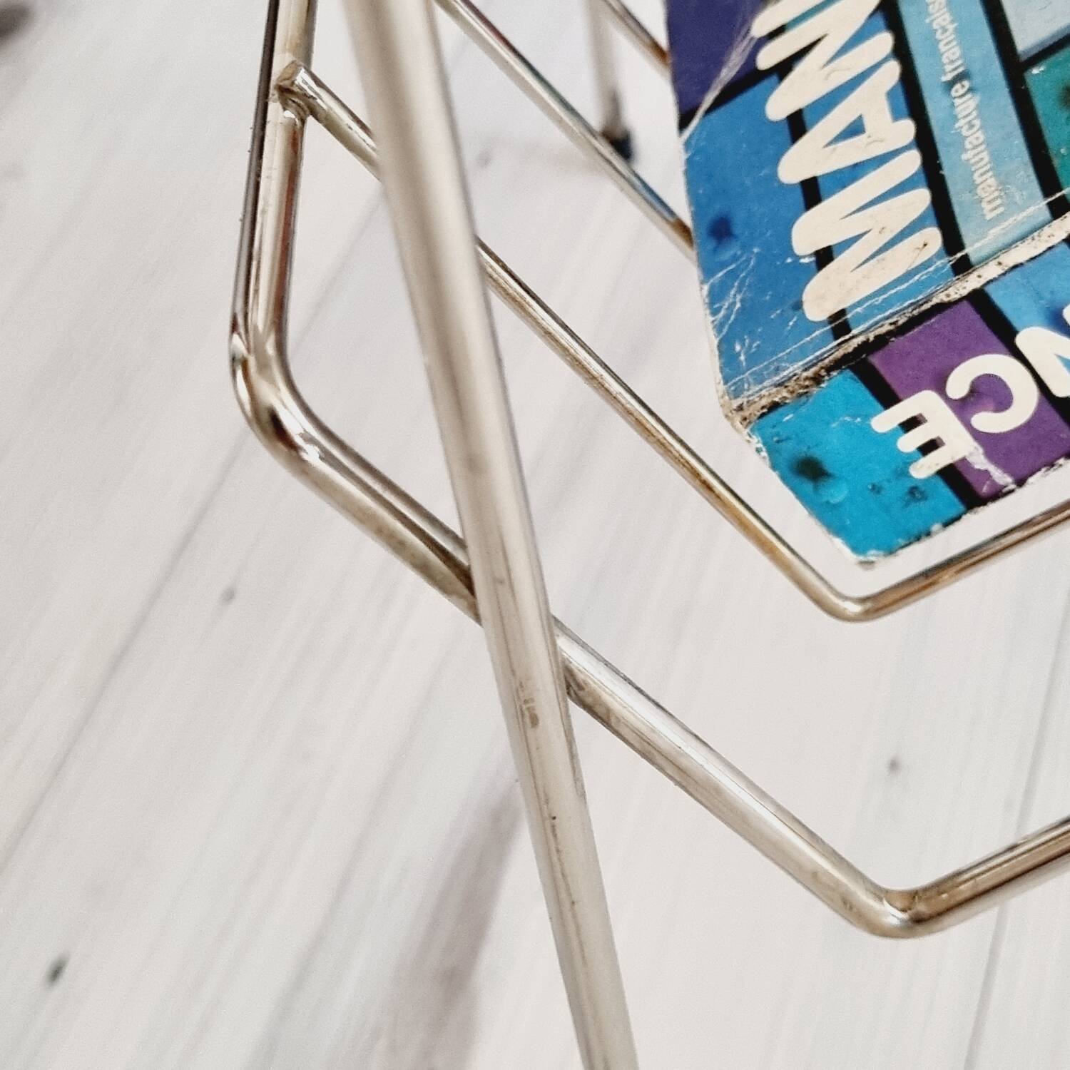 Metal and Formica magazine rack side table