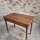 Antique French writing table in walnut with a drawer, circa 1900.