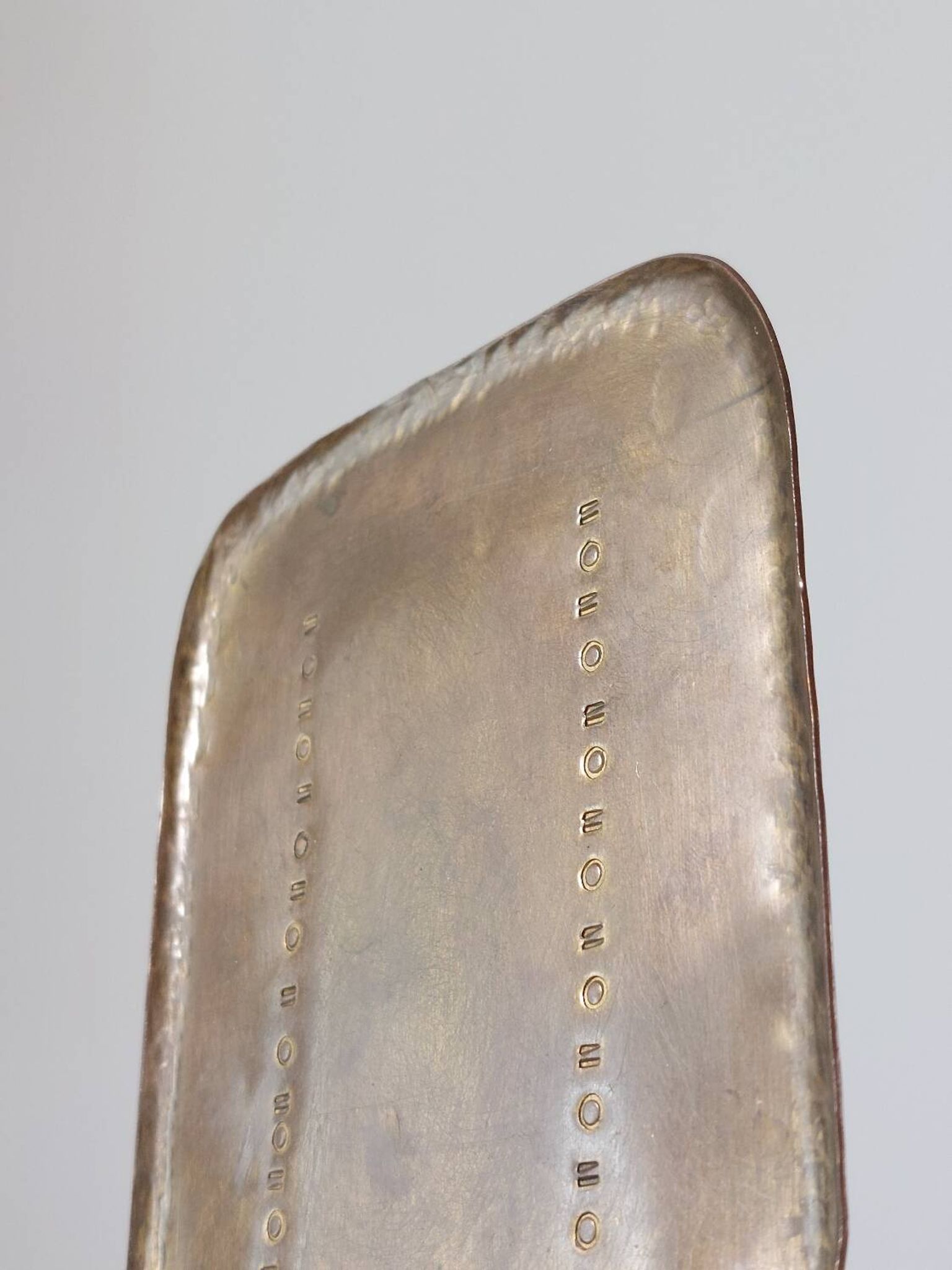 Pair of hand-hammered brass bookends by Hayno Focken