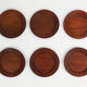 Six Danish teak dessert plates including three marked Kay Bojesen