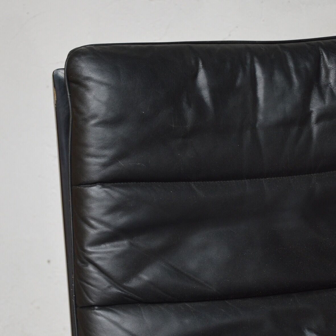 Black leather armchair and canning