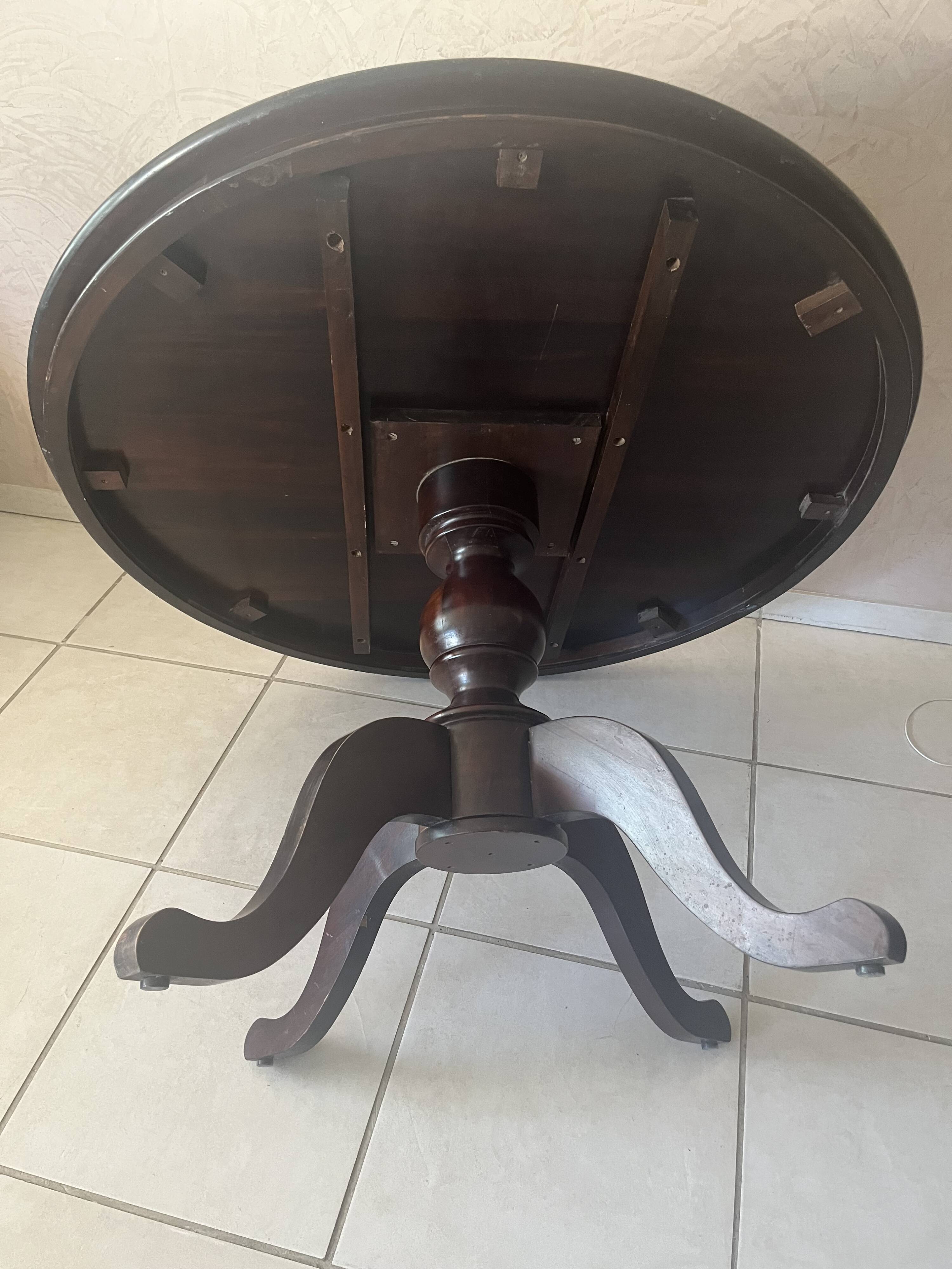 Round solid wood table